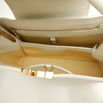 Louis Vuitton Gold Leather Handbag