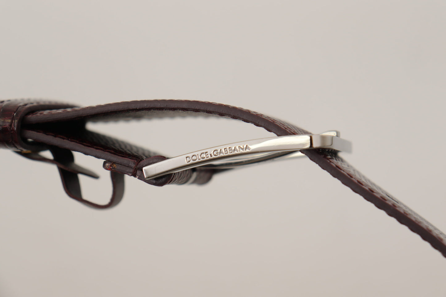 Dolce & Gabbana Elegant Maroon Leather Belt With Engraved Buckle