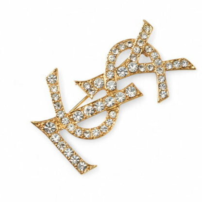 Saint Laurent Gold Metal Cassandre