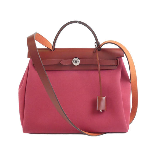 Hermès Red Canvas Herbag