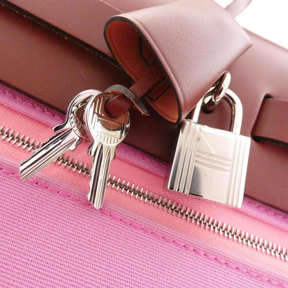 Hermès Red Canvas Herbag