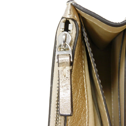 Tory Burch Gold Leather Clutch