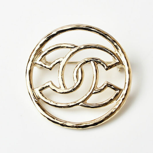 Chanel Gold Metal Coco Mark