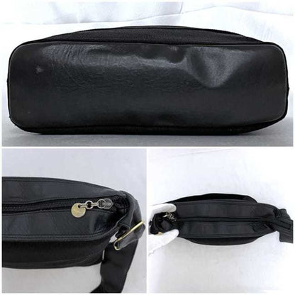 Salvatore Ferragamo Black Canvas Vara