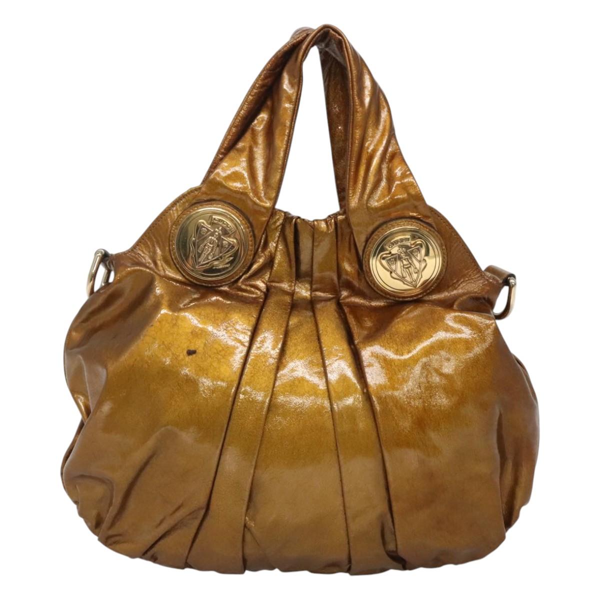 Gucci Gold Patent Leather Hysteria