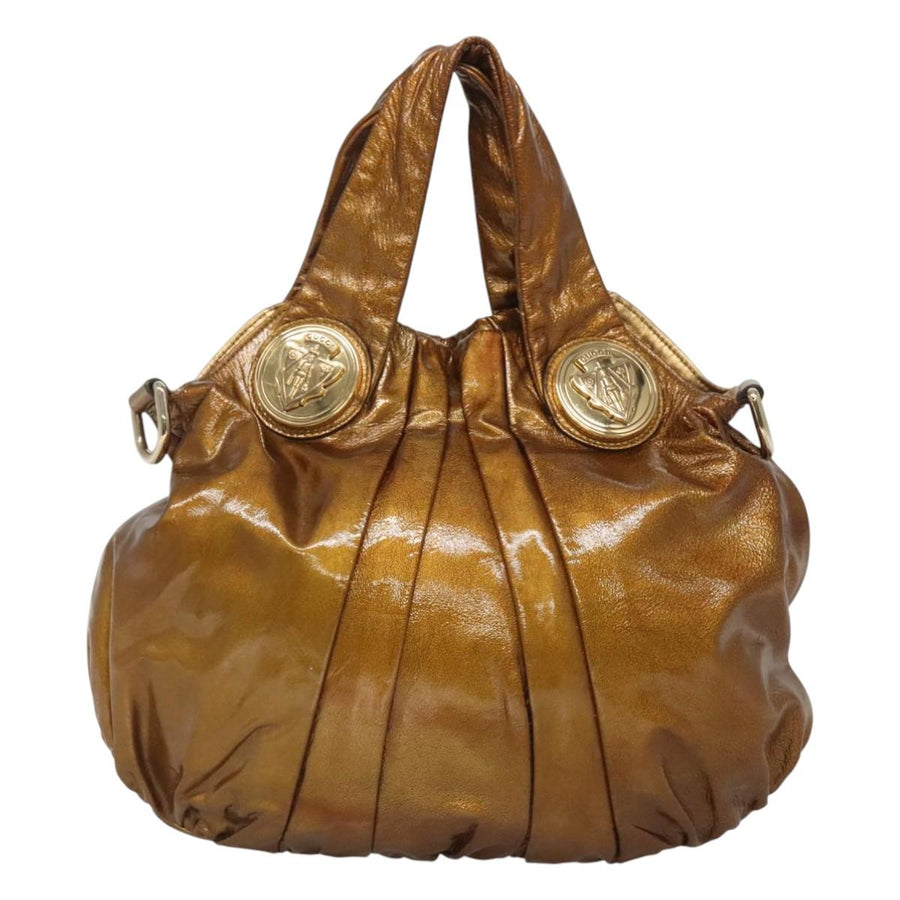 Gucci Gold Patent Leather Hysteria