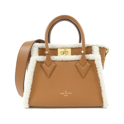 Louis Vuitton Gold Leather On My Side