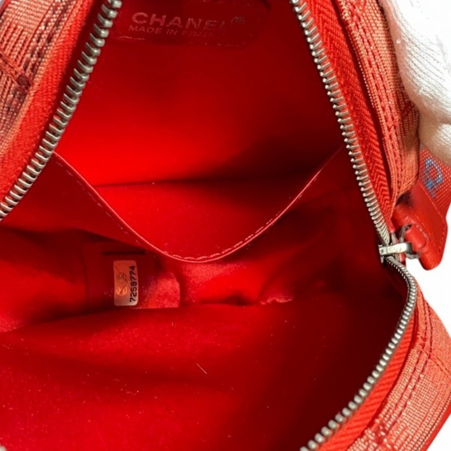 Chanel Red Synthetic Travel Line