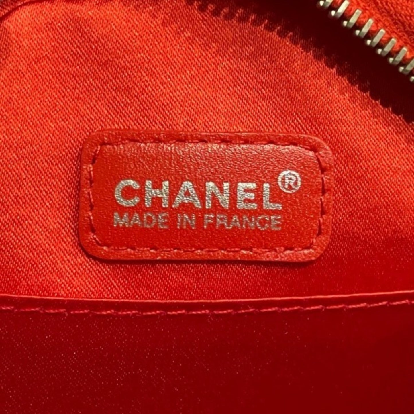 Chanel Red Synthetic Travel Line