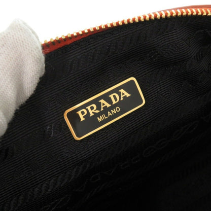 Prada Orange Leather Clutch