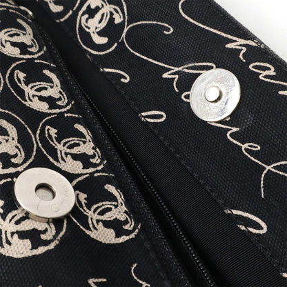 Chanel Black Canvas Camellia