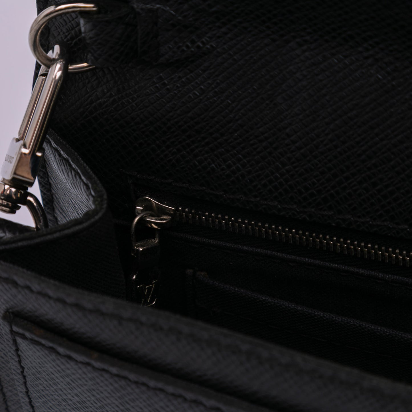 Louis Vuitton Taiga Belaia Clutch