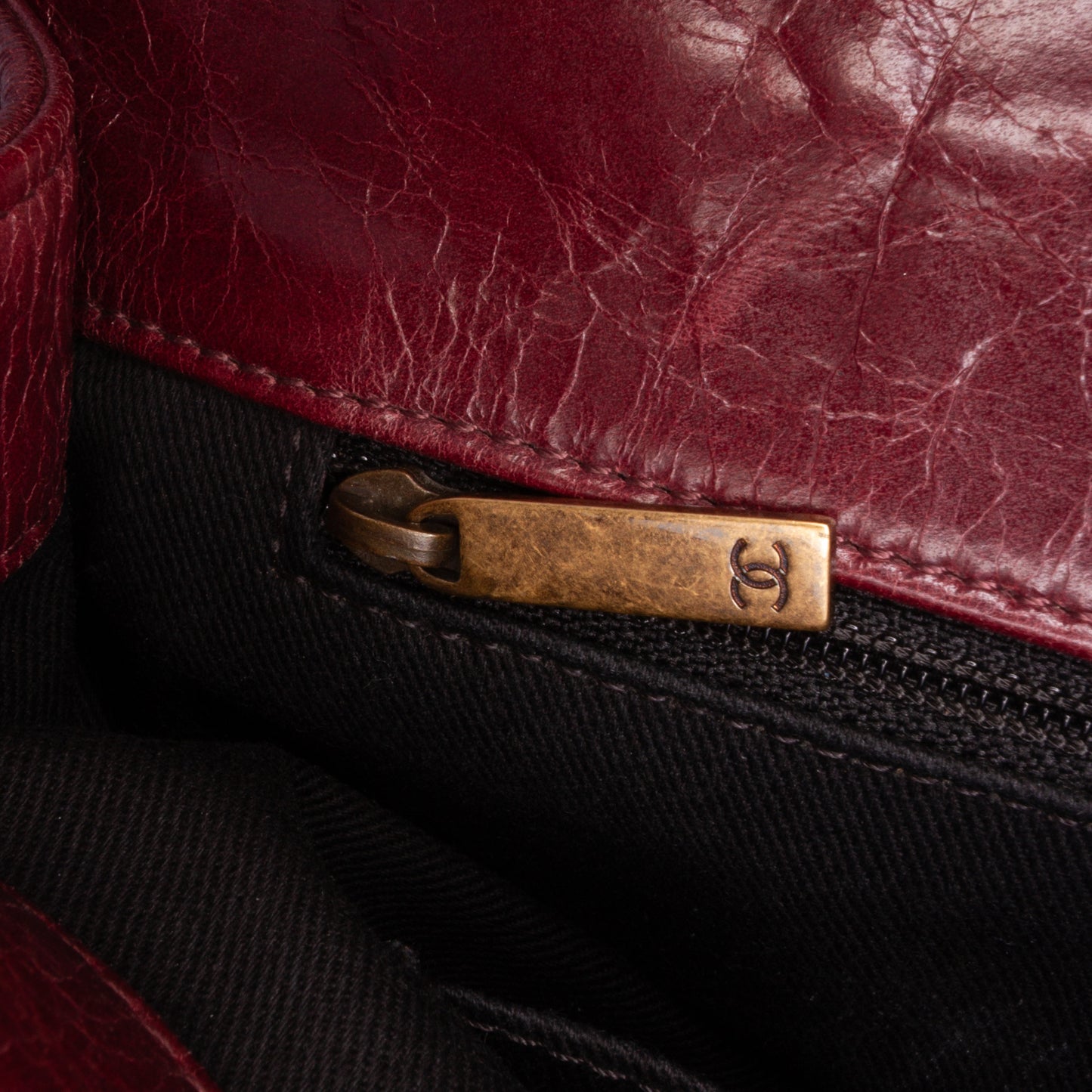 Chanel Medium Glazed Calfskin Castle Rock Top Handle Flap