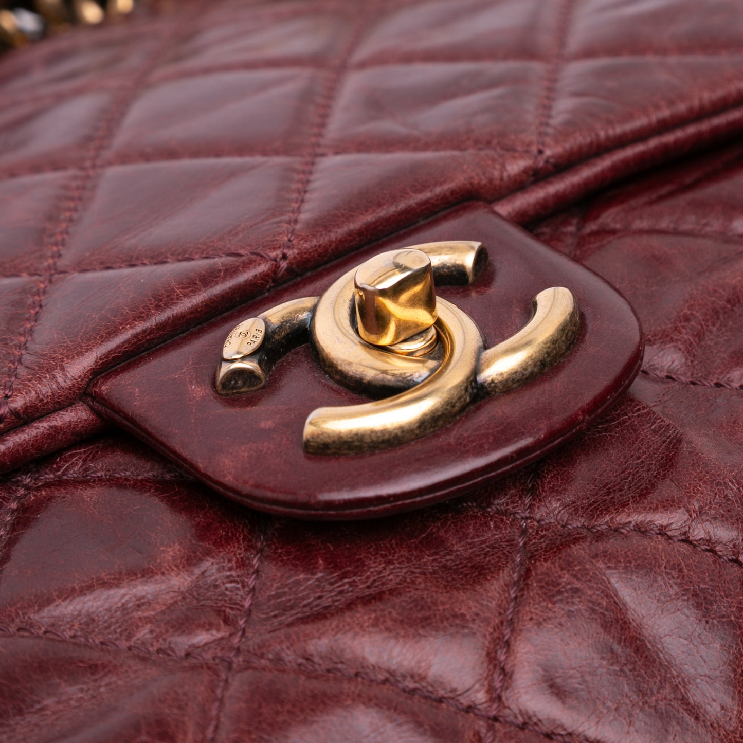 Chanel Medium Glazed Calfskin Castle Rock Top Handle Flap
