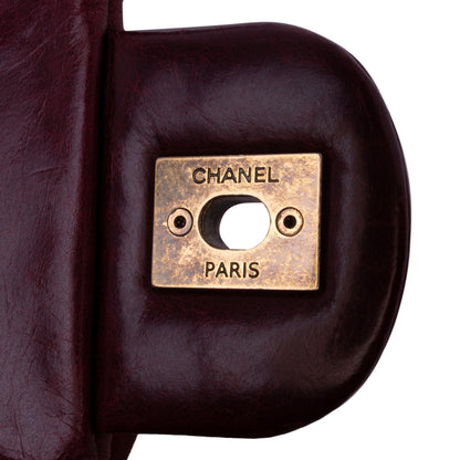 Chanel Medium Glazed Calfskin Castle Rock Top Handle Flap