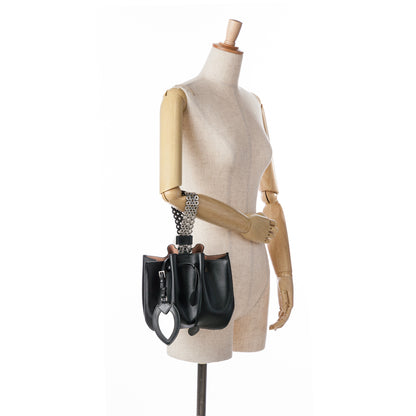 ALAÏA Calfskin Eyelet Bracelet Embellished Bucket Bag (20005)